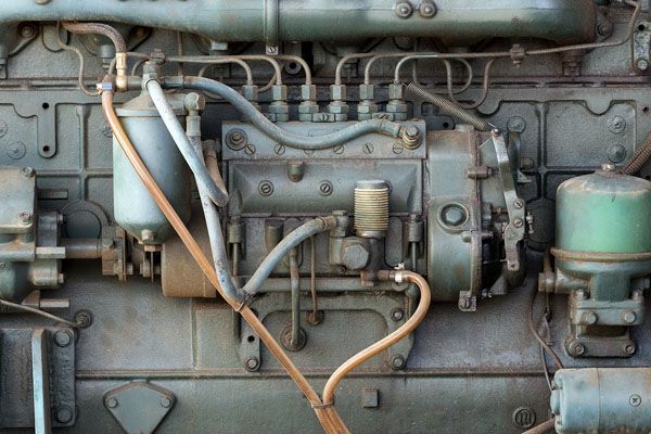 a close up of a diesel engine with a lot of wires coming out of it