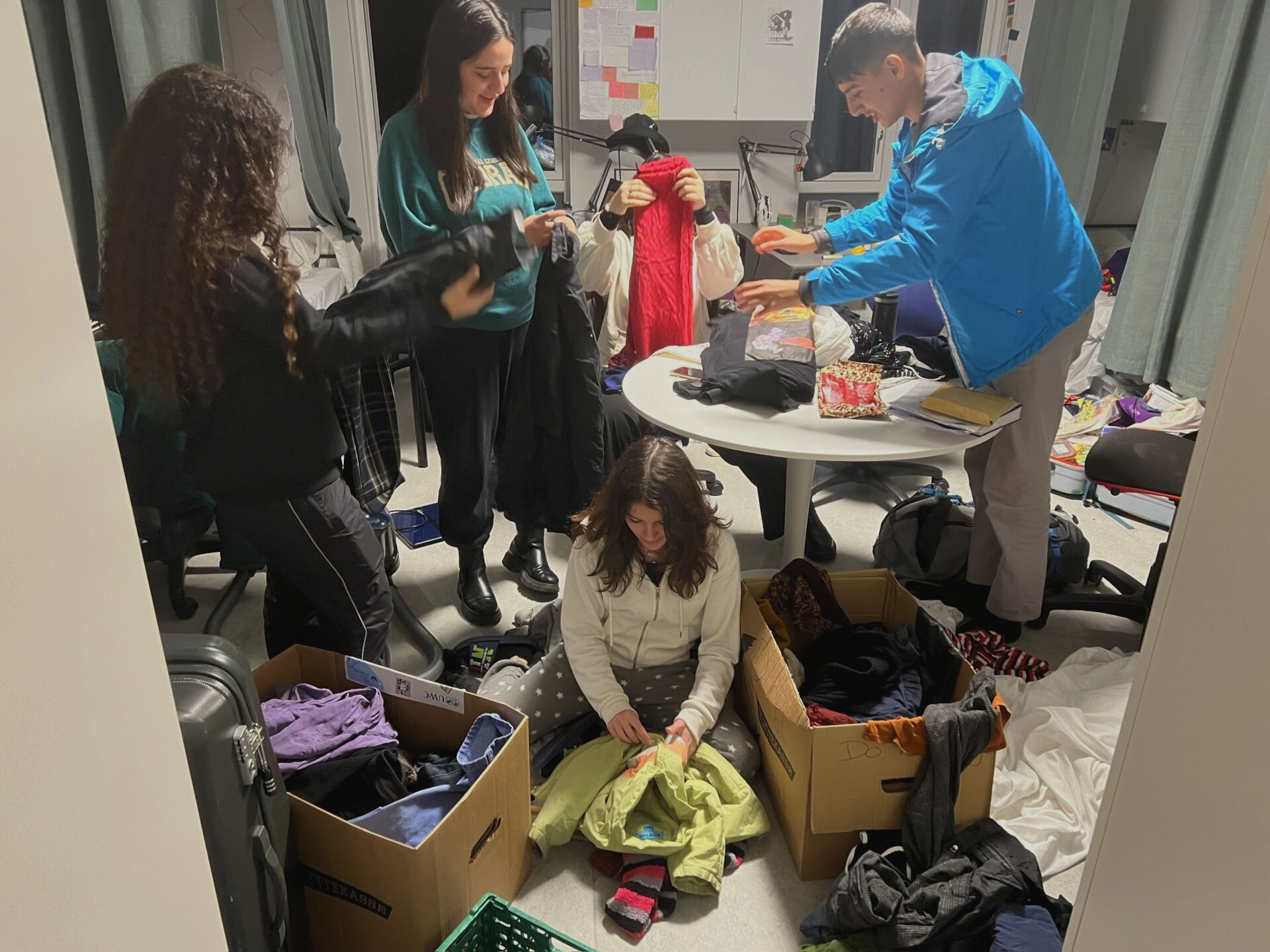 DNF Team while sorting out the clothes preparing them to ship them to Lebanon, Do not forget organization.