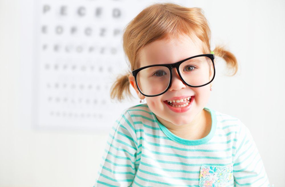 Little girl wearing eyeglasses