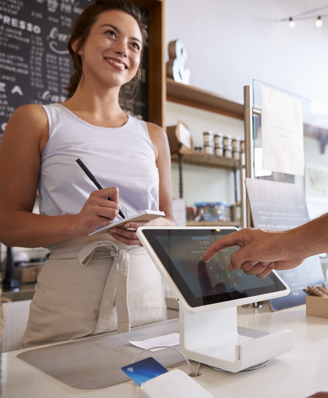 A small coffee shop owner who is glad they asked about a Los Angeles Employee Benefits Broker