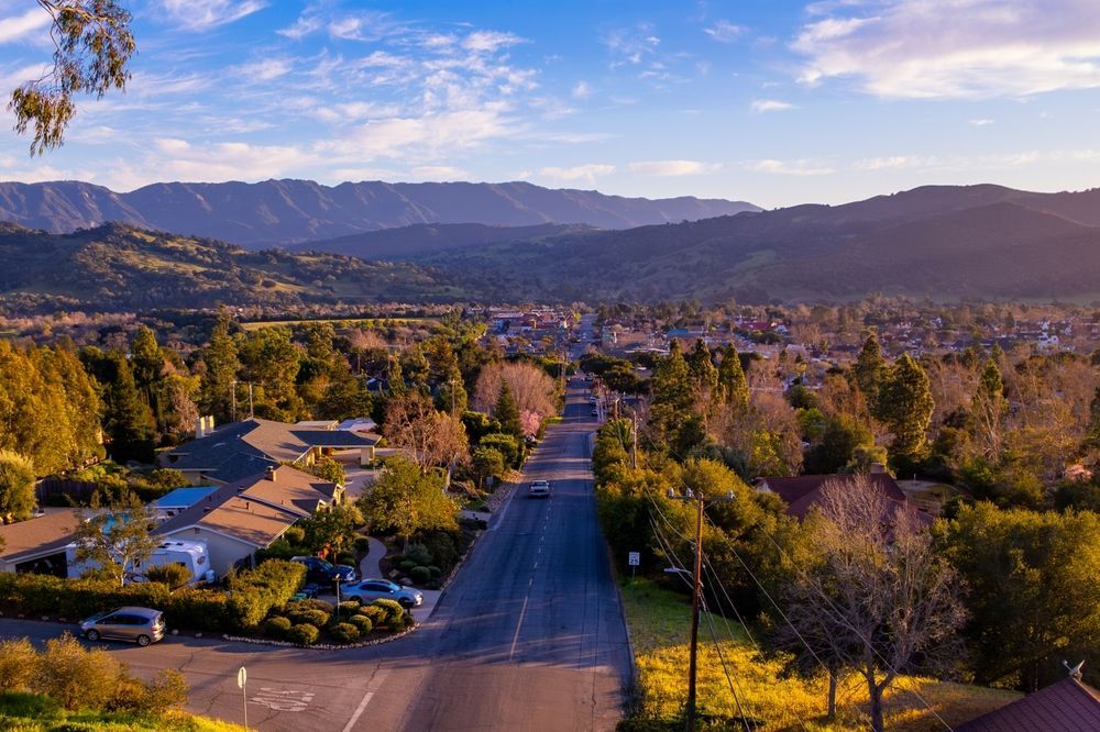 An aerial view of a beach at sunset.