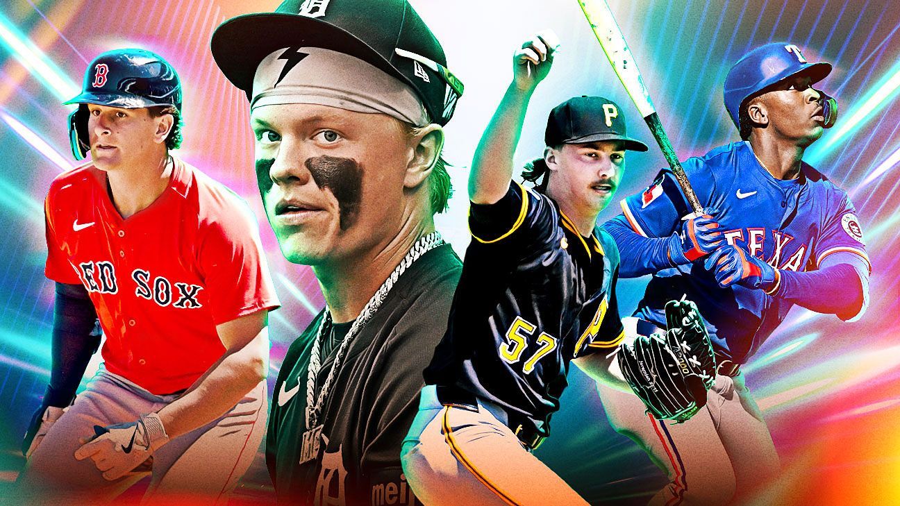 A group of baseball players are standing next to each other holding bats.