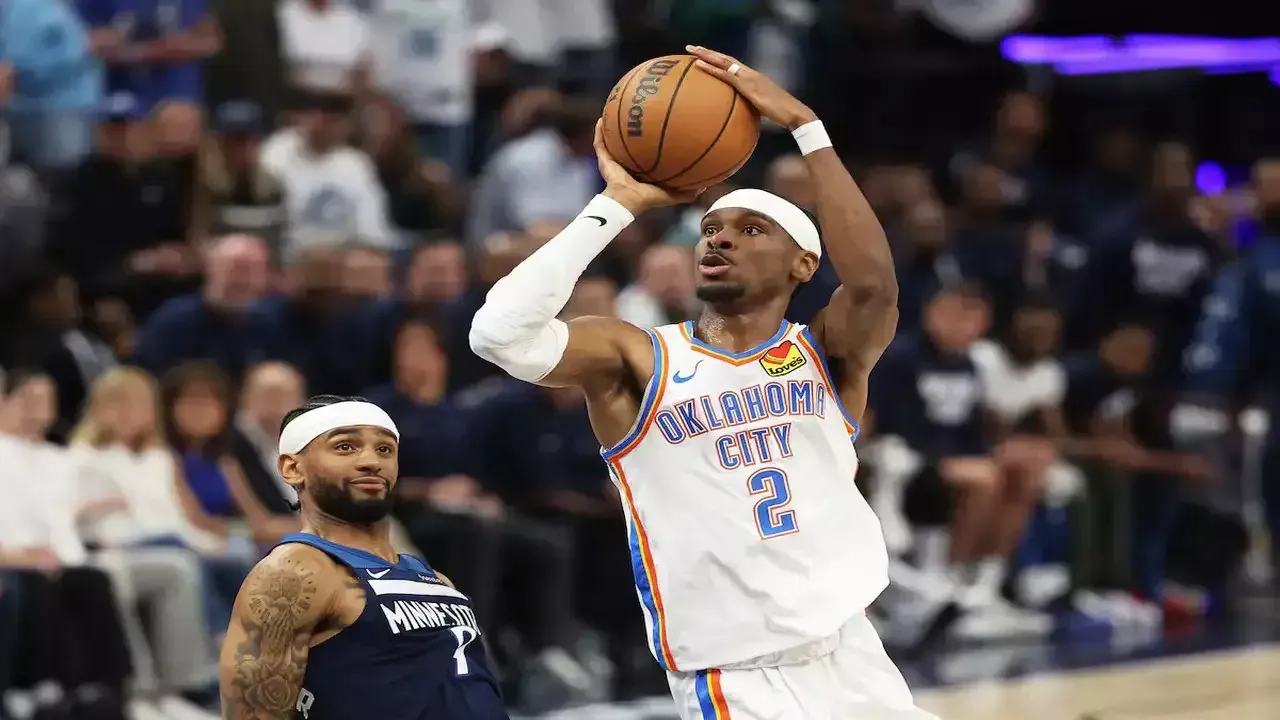 Player shooting a basketball into a hoop