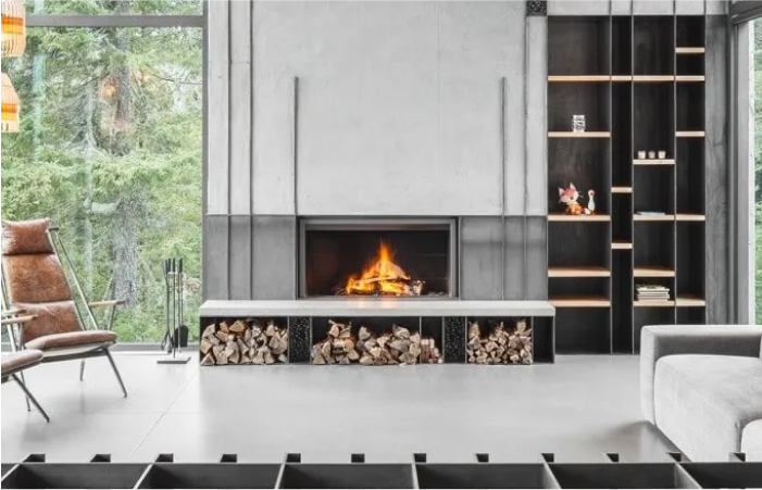 A living room with a fireplace and a chair