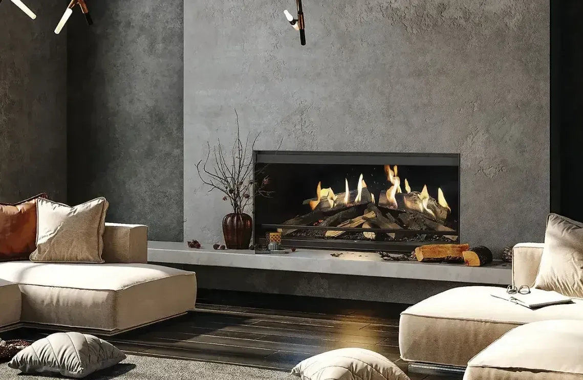 A living room with a fireplace and a couch.