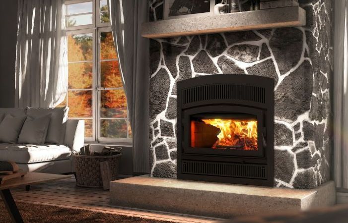 There is a fireplace with a flat screen tv above it.