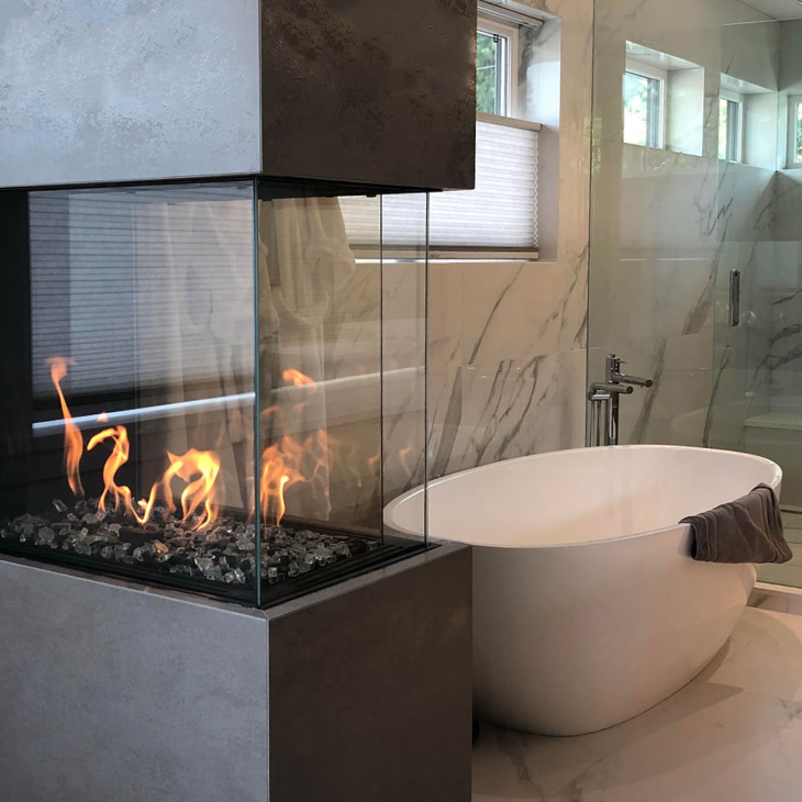 A bathroom with a fireplace and a bathtub