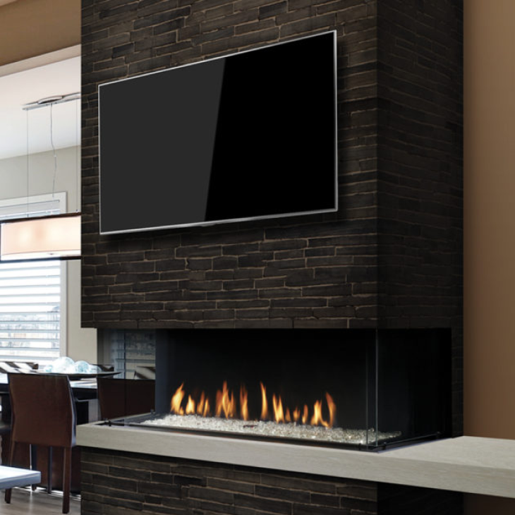 A fireplace with a flat screen tv above it