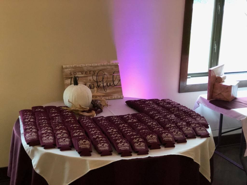 A table with a lot of place cards on it