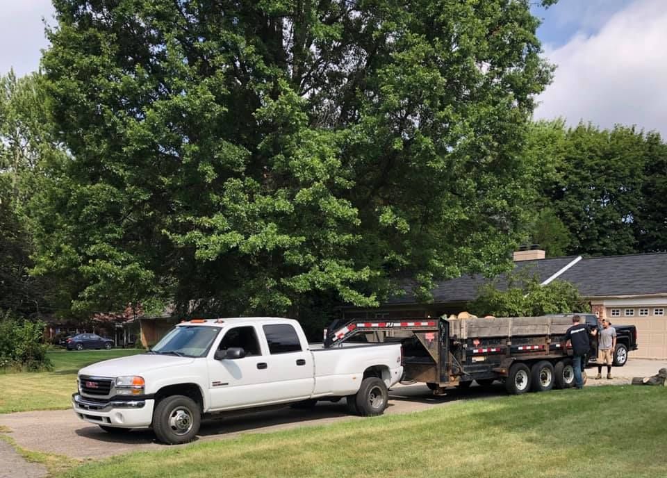 Loading Branches To The Truck - Orion, MI - L & L Tree Service-LO, Inc