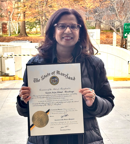Tazeen Ahmad is holding a certificate from the state of maryland
