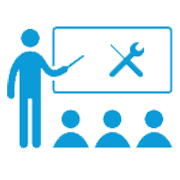 Instructor points to a wrench and screwdriver on a whiteboard, teaching an audience.