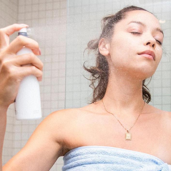 Woman applying Dermalogica multi active toner