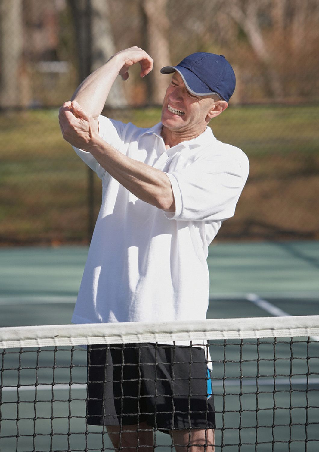 Tennis Player Suffering from Elbow Pain