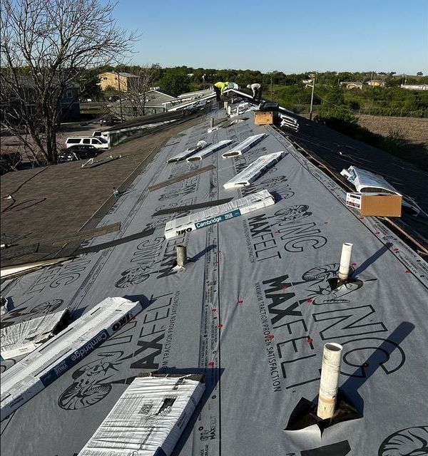 A roof with a roofing material that says maxwell on it