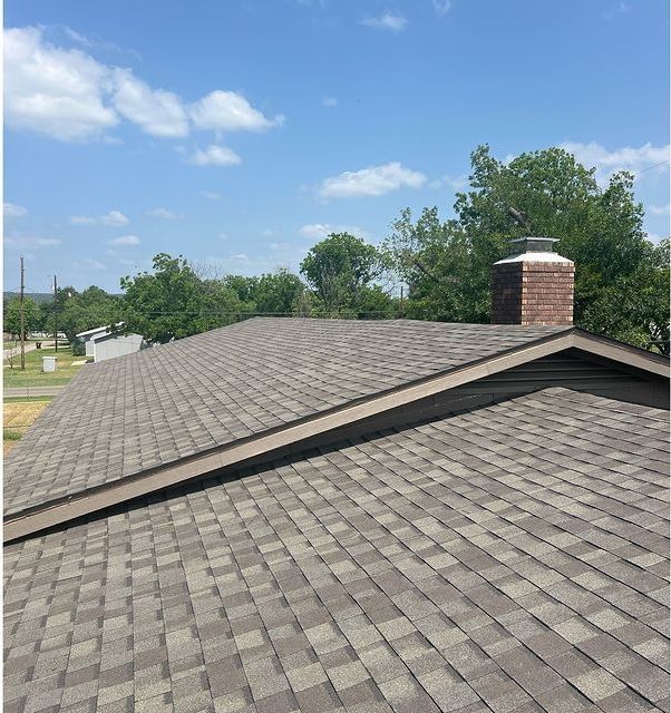 A roof with a chimney on top of it