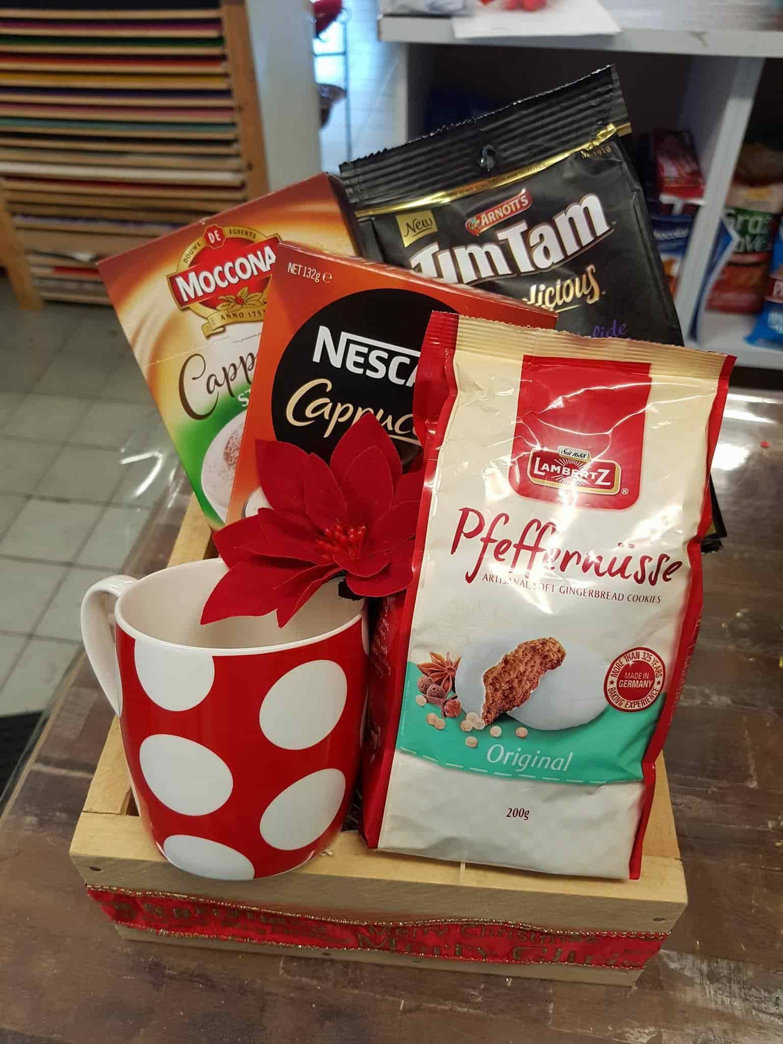 A Basket Filled With Coffee , a Cup , and Two Bags of Coffee — The Flower Station Townsville In Kirwan, QLD A Basket Filled With Coffee , a Cup , and Two Bags of Coffee — The Flower Station Townsville In Kirwan, QLD
