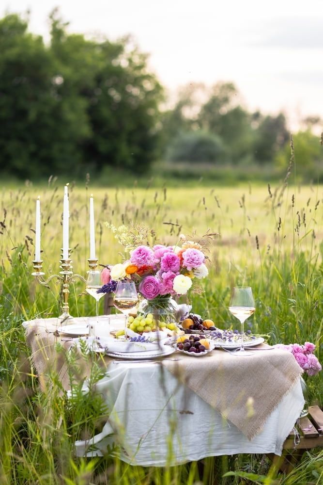A Table Set for a Picnic in the Middle of a Field — The Flower Station Townsville In Kirwan, QLD A Table Set for a Picnic in the Middle of a Field — The Flower Station Townsville In Kirwan, QLD