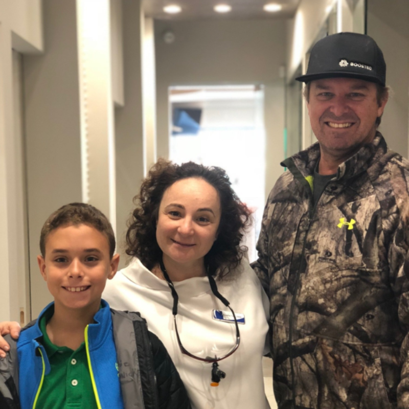 Dr. Lyuba Taft and her patients smiling