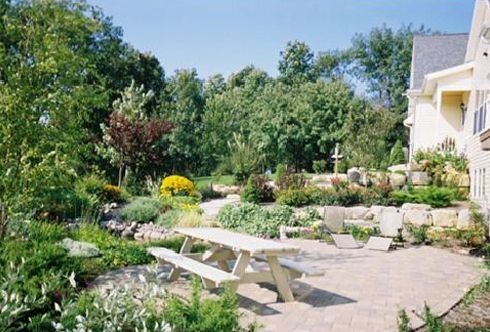 Table in the Lush Green Garden | Middleton, WI | Kalscheur Landscaping, Inc.