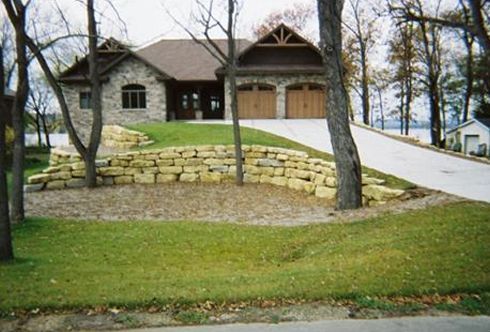 Large House with a Stone Wall | Middleton, WI | Kalscheur Landscaping, Inc.