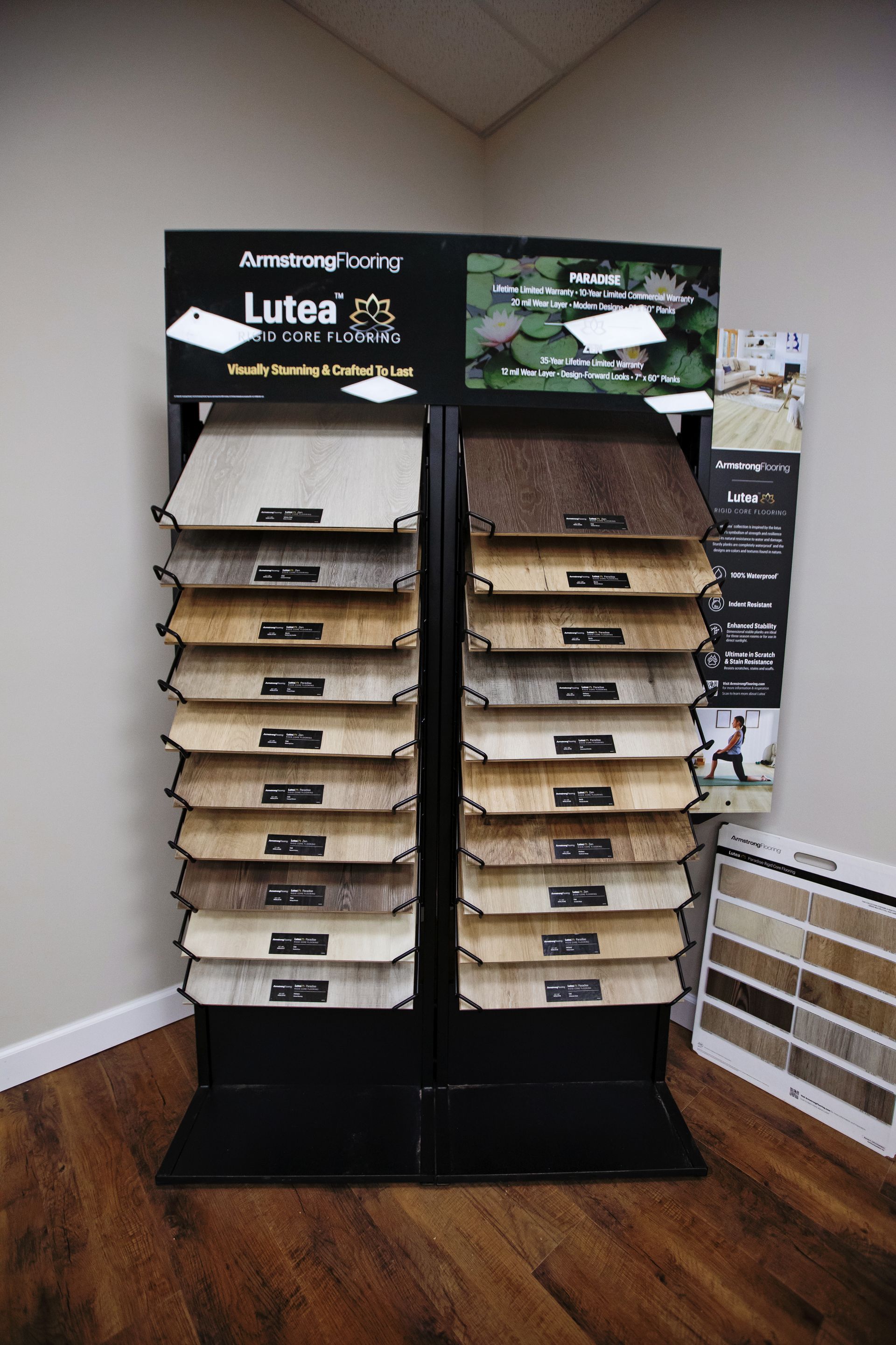 There are many different types of tiles on display in a store.