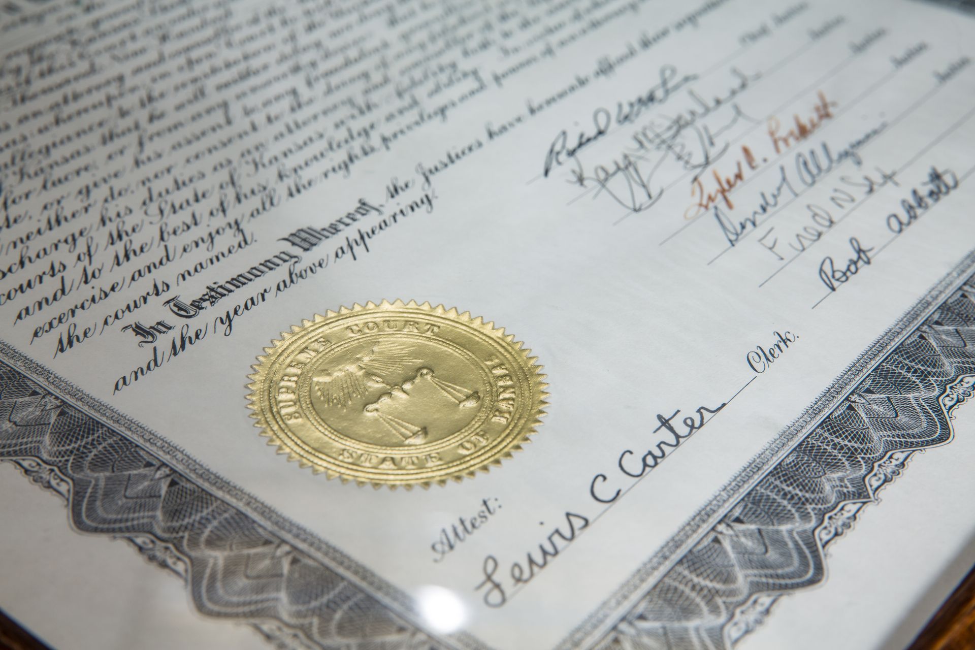 A close up of a lewis c carter certificate