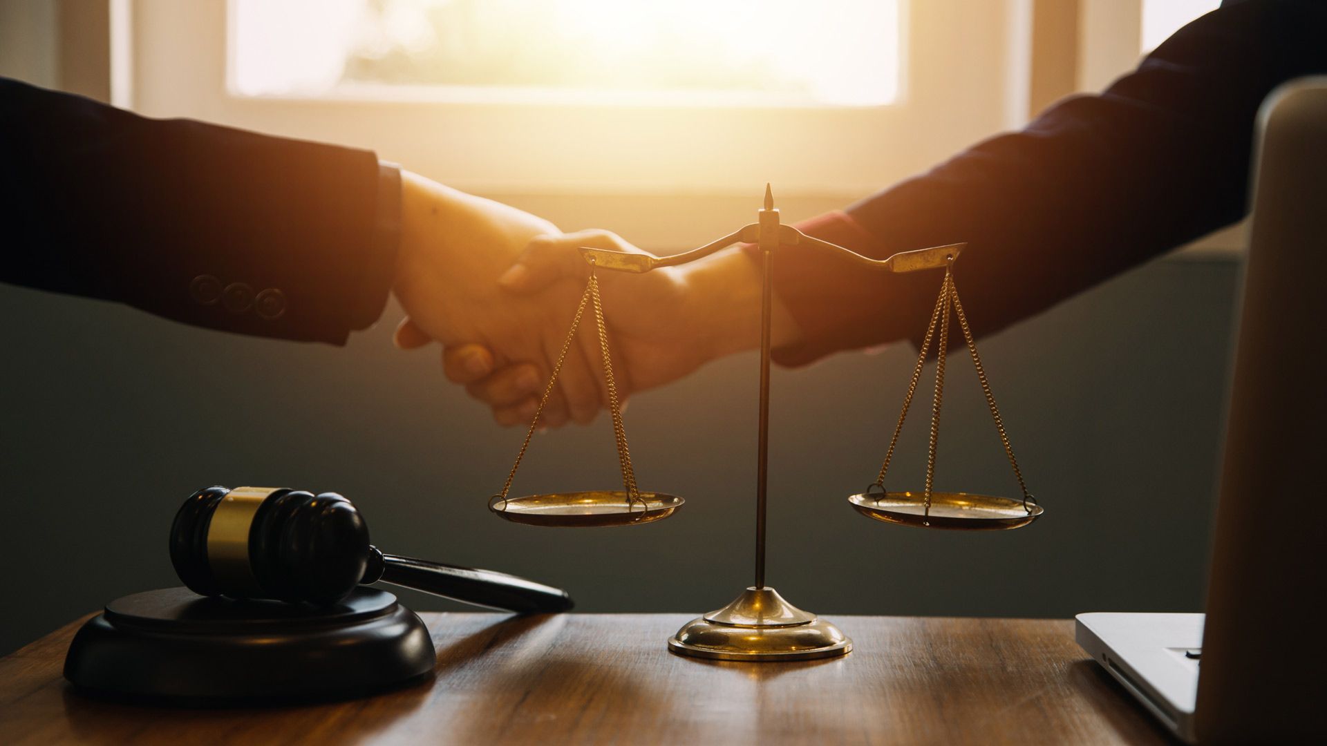 Attorney and Client Shaking Hands