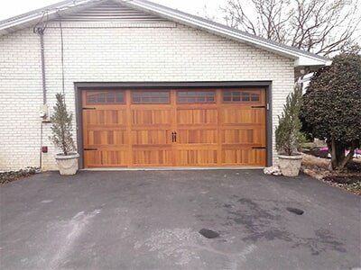 Installation of Doors — Garage With New Wooden Door in Johnson City, TN