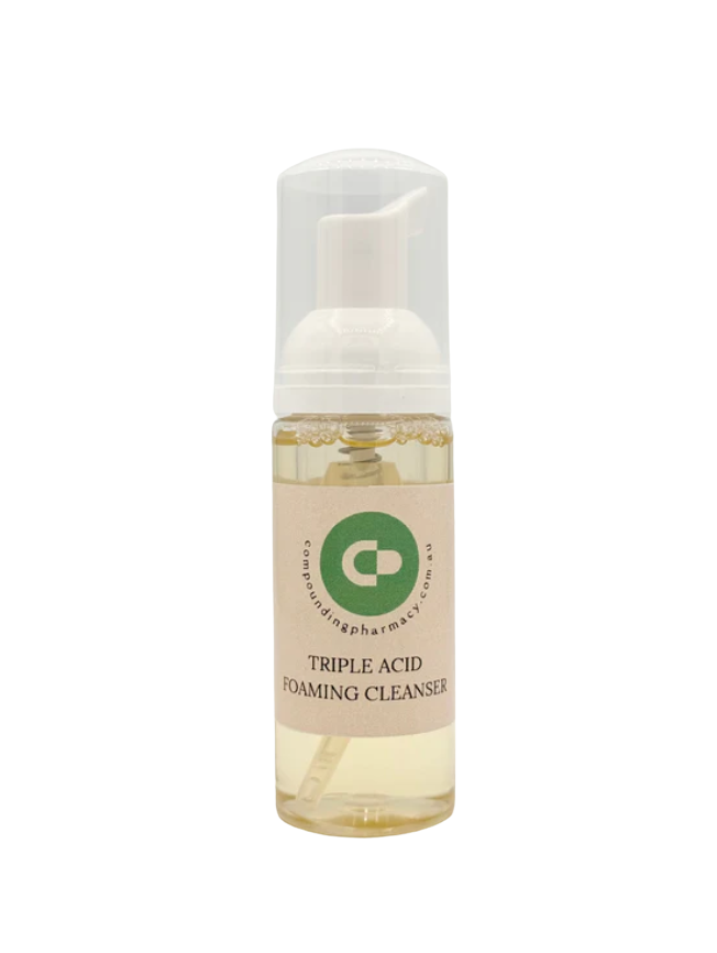 Foaming cleanser in a clear bottle with a green and tan label; Triple Acid.