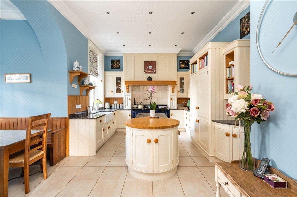 interior painting and decorating - kitchen - blue - large ceilings - white woodwork