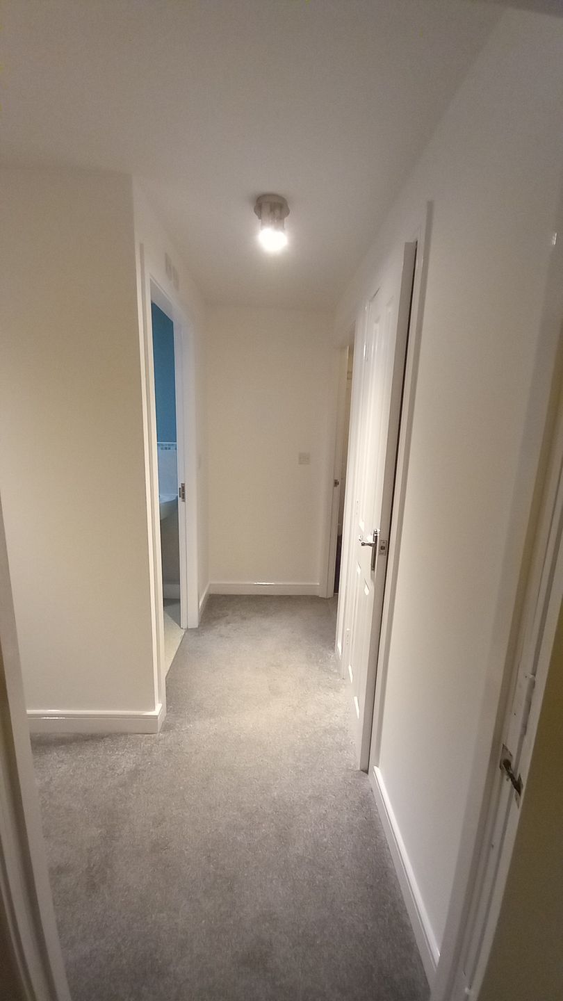 Low-disruption social housing corridor painting – breathable finishes applied during void to ensure fast, clean handover