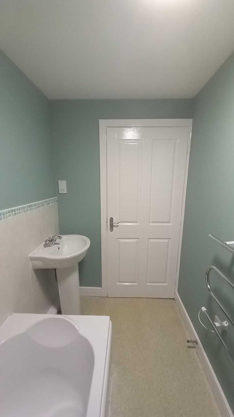 Efficient social housing bathroom update – durable coatings on walls and joinery for easy cleaning and tenant satisfaction