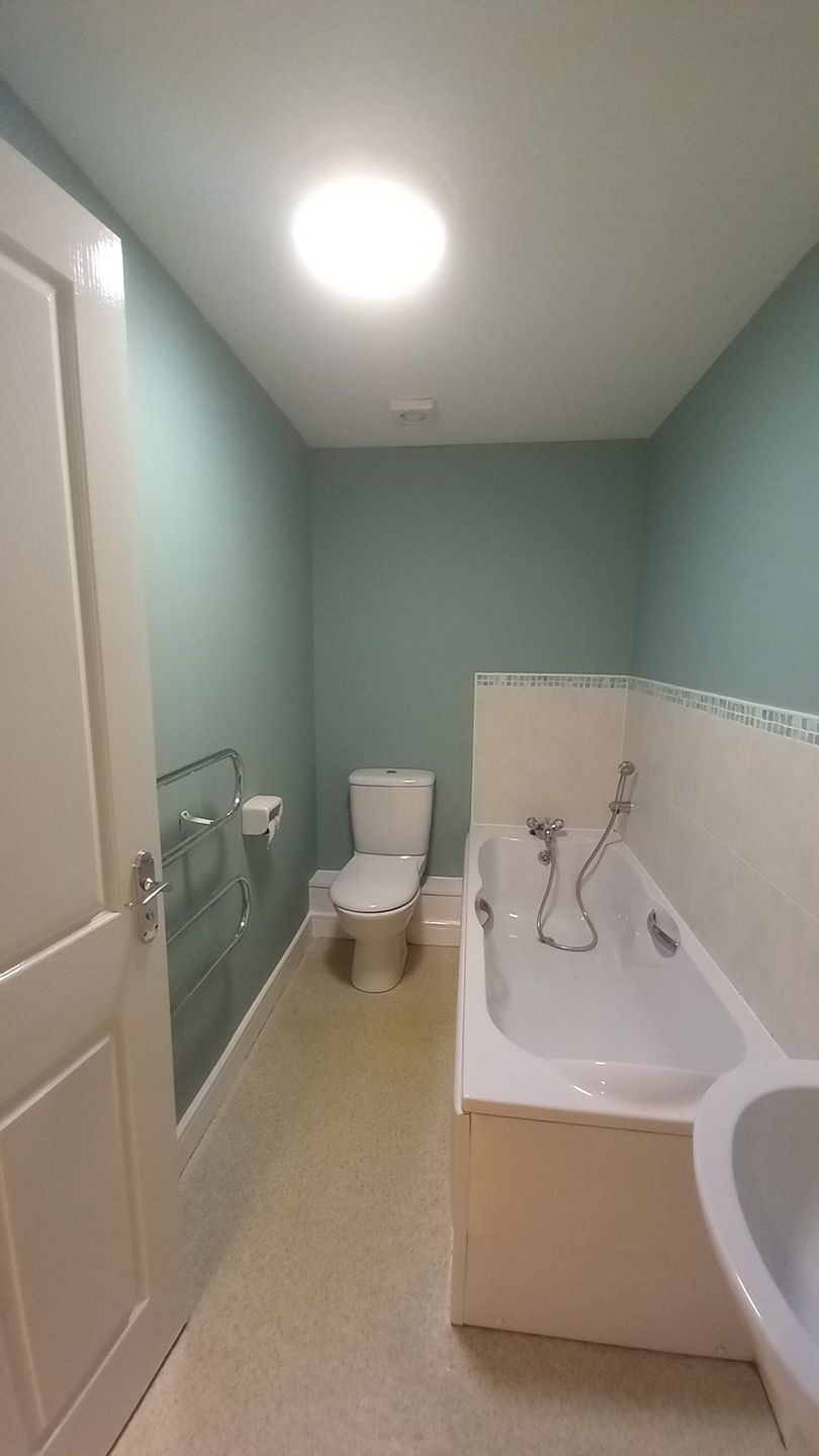 Social housing bathroom – breathable, mould-resistant paints applied to create fresh, welcoming space for residents