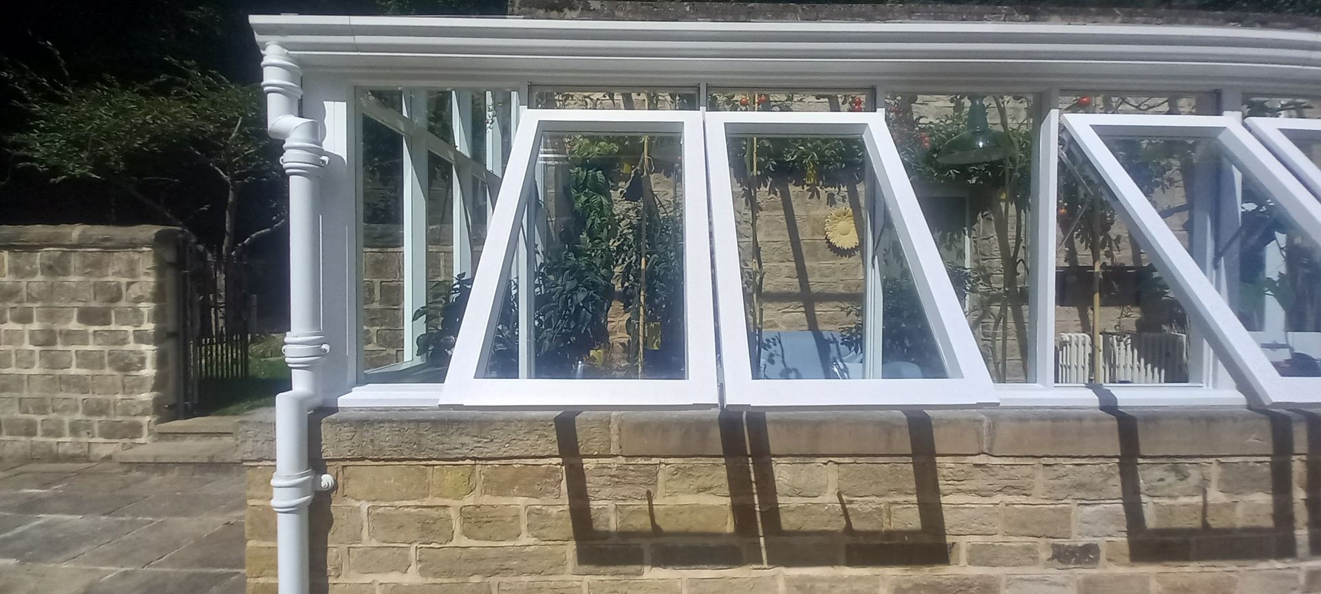 Maintenance on conservatory  and pipework – minor wear addressed, protective coating applied to preserve crisp white finish