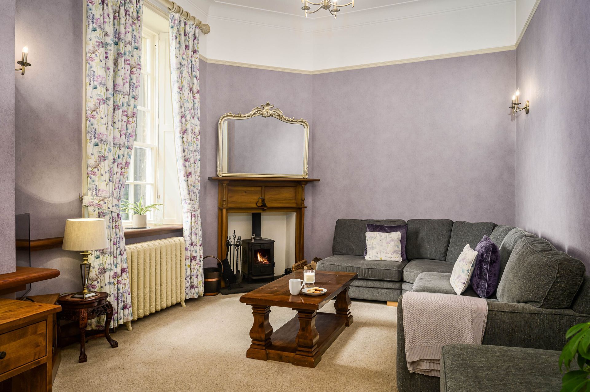 Specialist wallcovering in elegant period home – subtle pattern preserving the room’s historic proportions and light