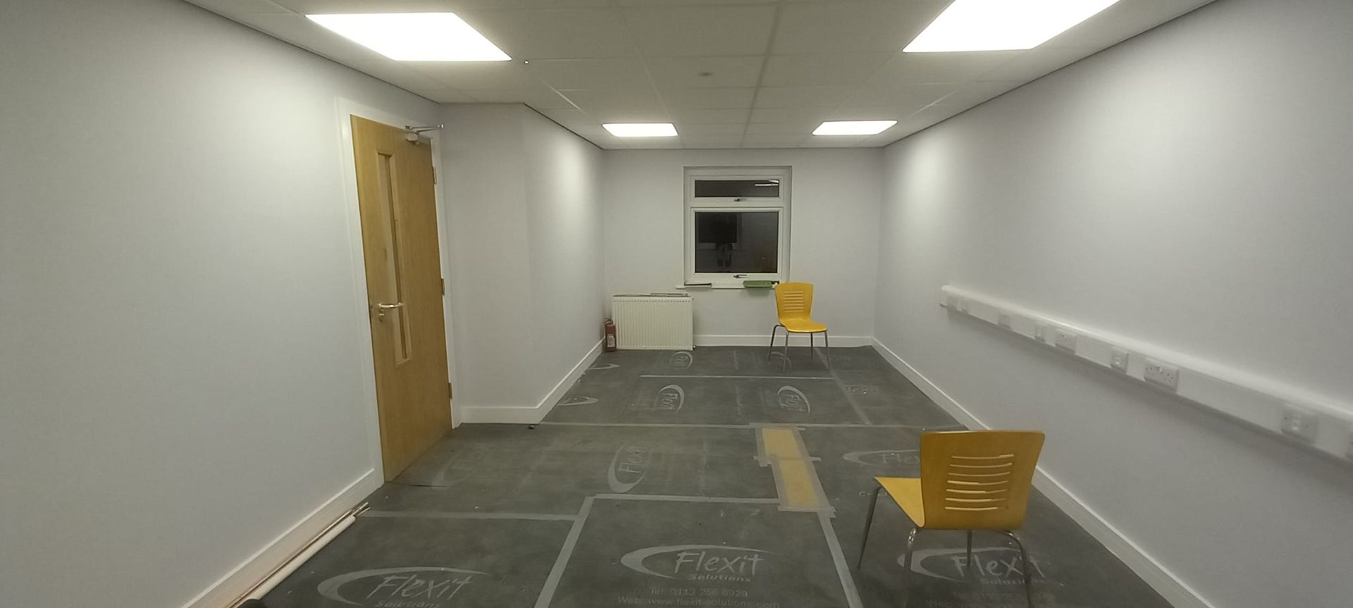 Managed school classroom transformation – wipeable, low-VOC coatings delivered seamlessly during school holidays
