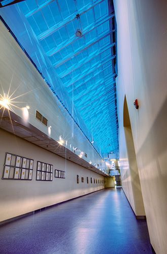 Electrochromic Glass showcased in large hallway with vaulted ceiling