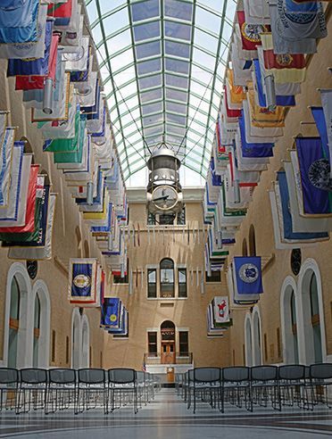 Photovoltaic Glass showcased in large room with vaulted ceiling