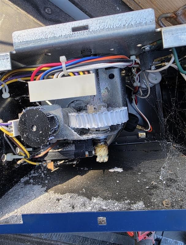 An empty parking garage with a white garage door.