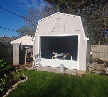 Shed Door During Installation — Port Washington, WI — Jiffy Overhead Door, LLC