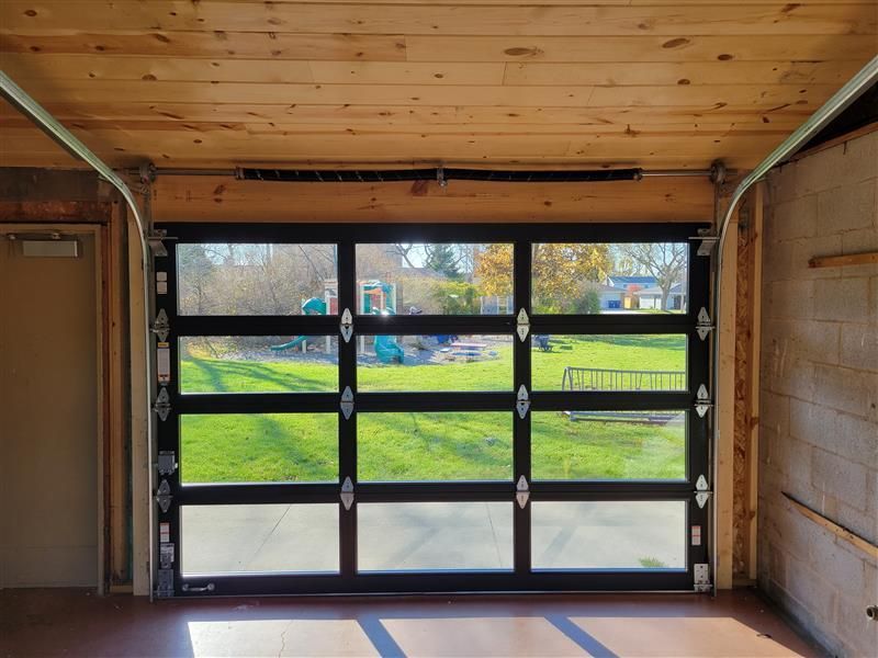 A close up of a garage door on a building.