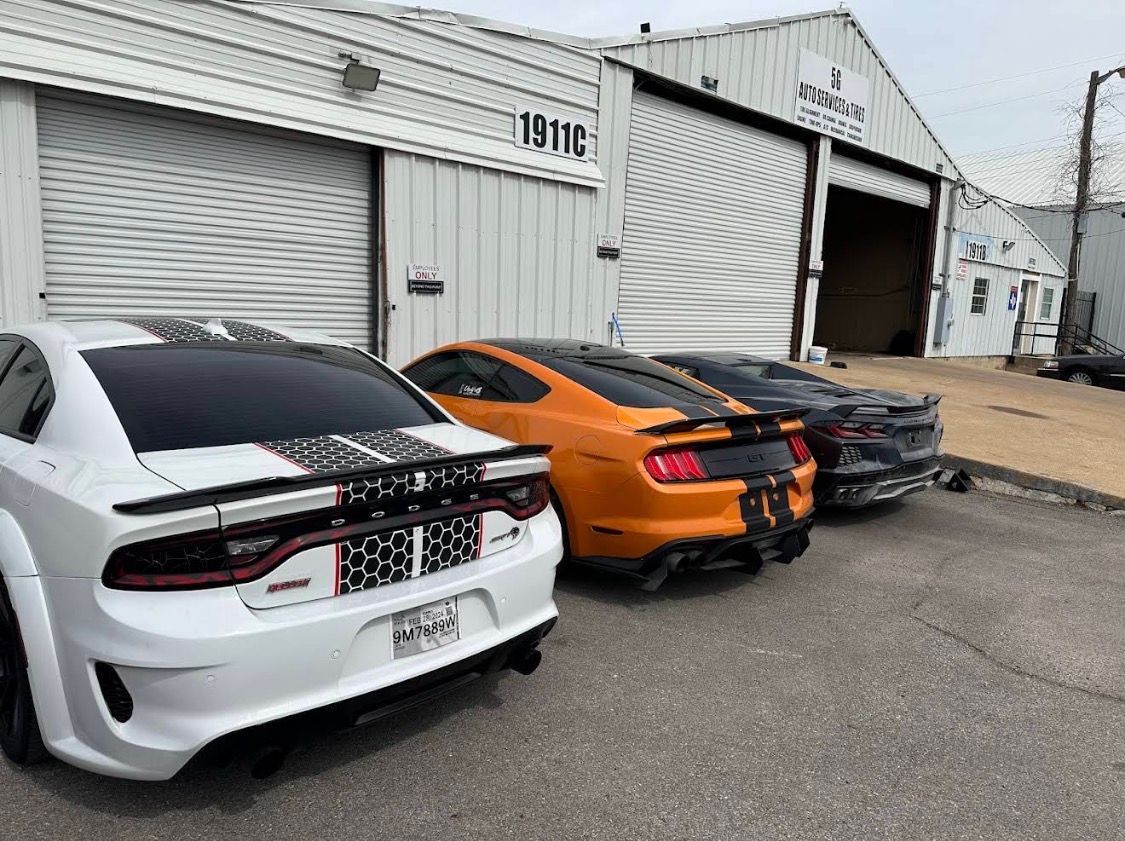 Rally Cars Parked Outside of Auto Shop | 5G Auto Service & Bodyshop