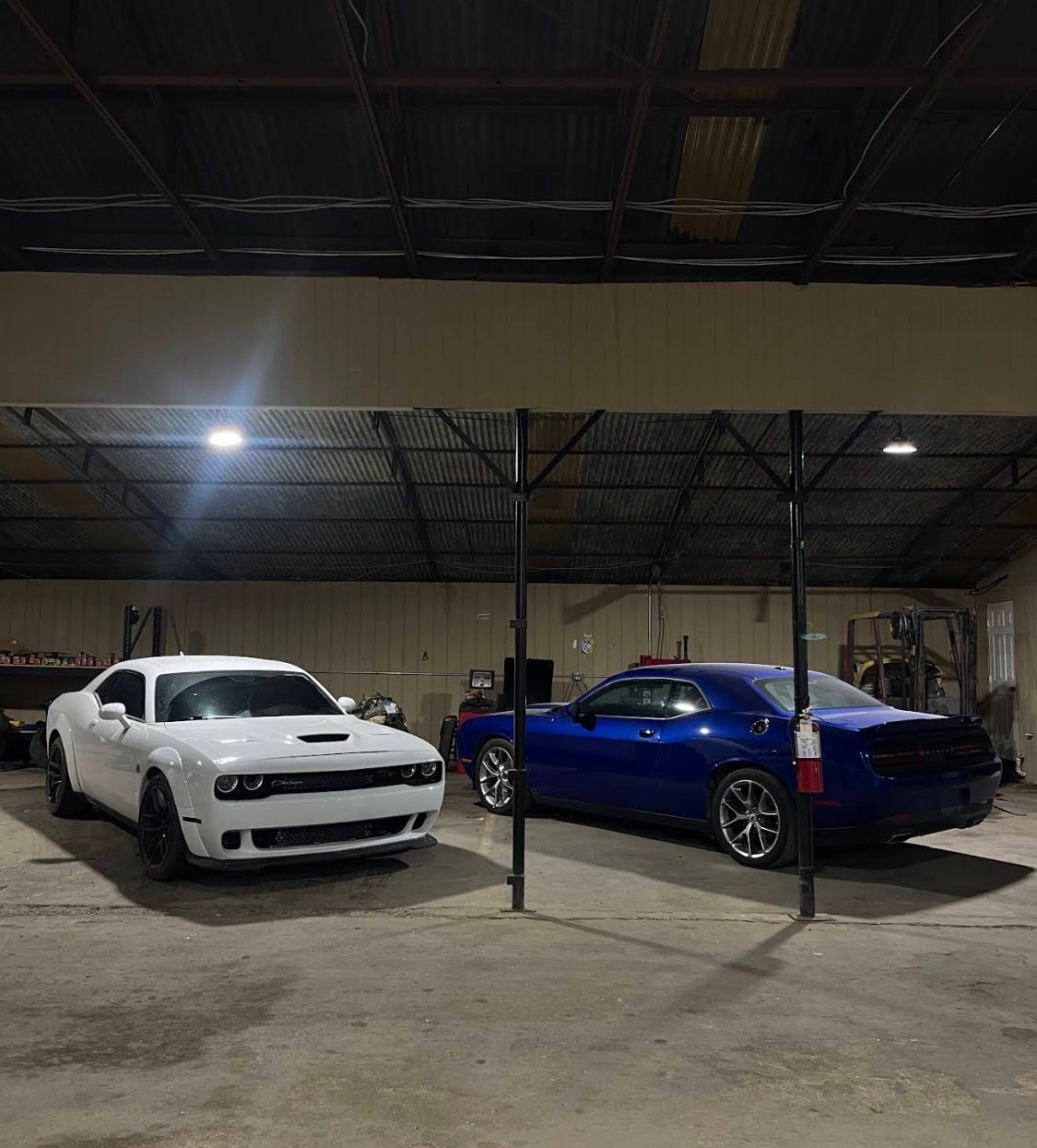 White Dodge Charger with Blue Sedan | 5G Auto Service & Bodyshop