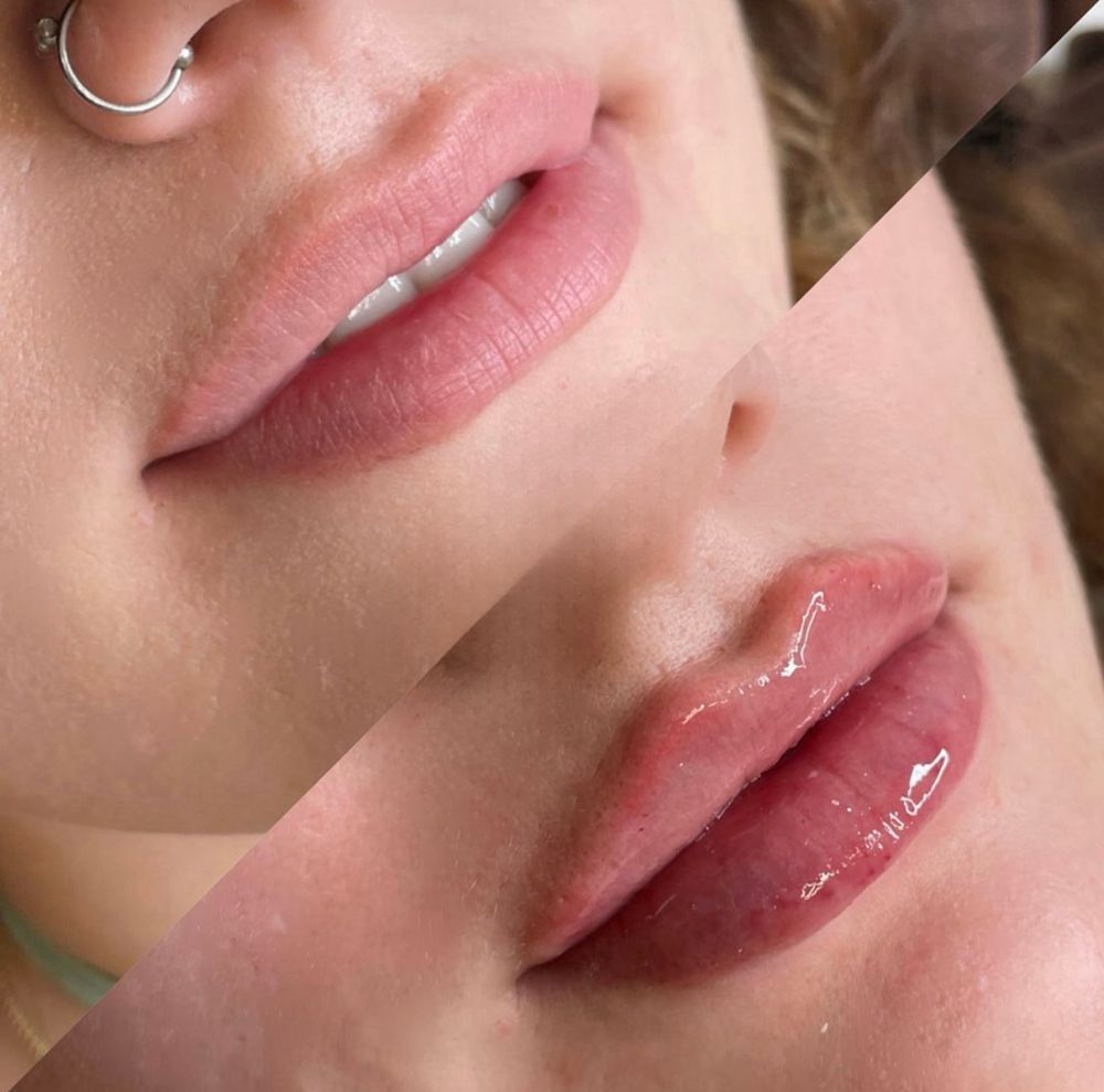 A close up of a woman 's lips with a nose ring
