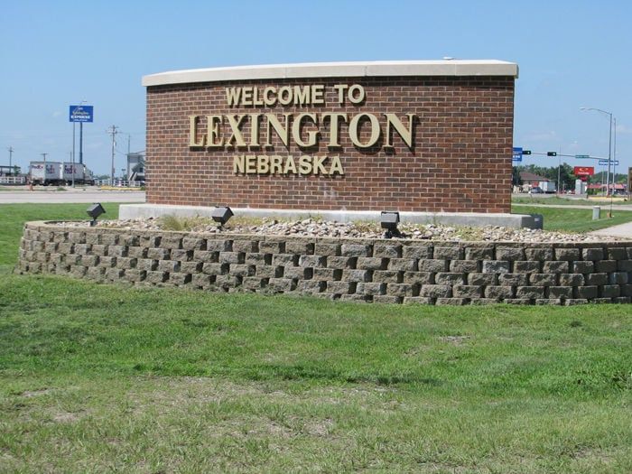 A brick sign that says welcome to lexington nebraska