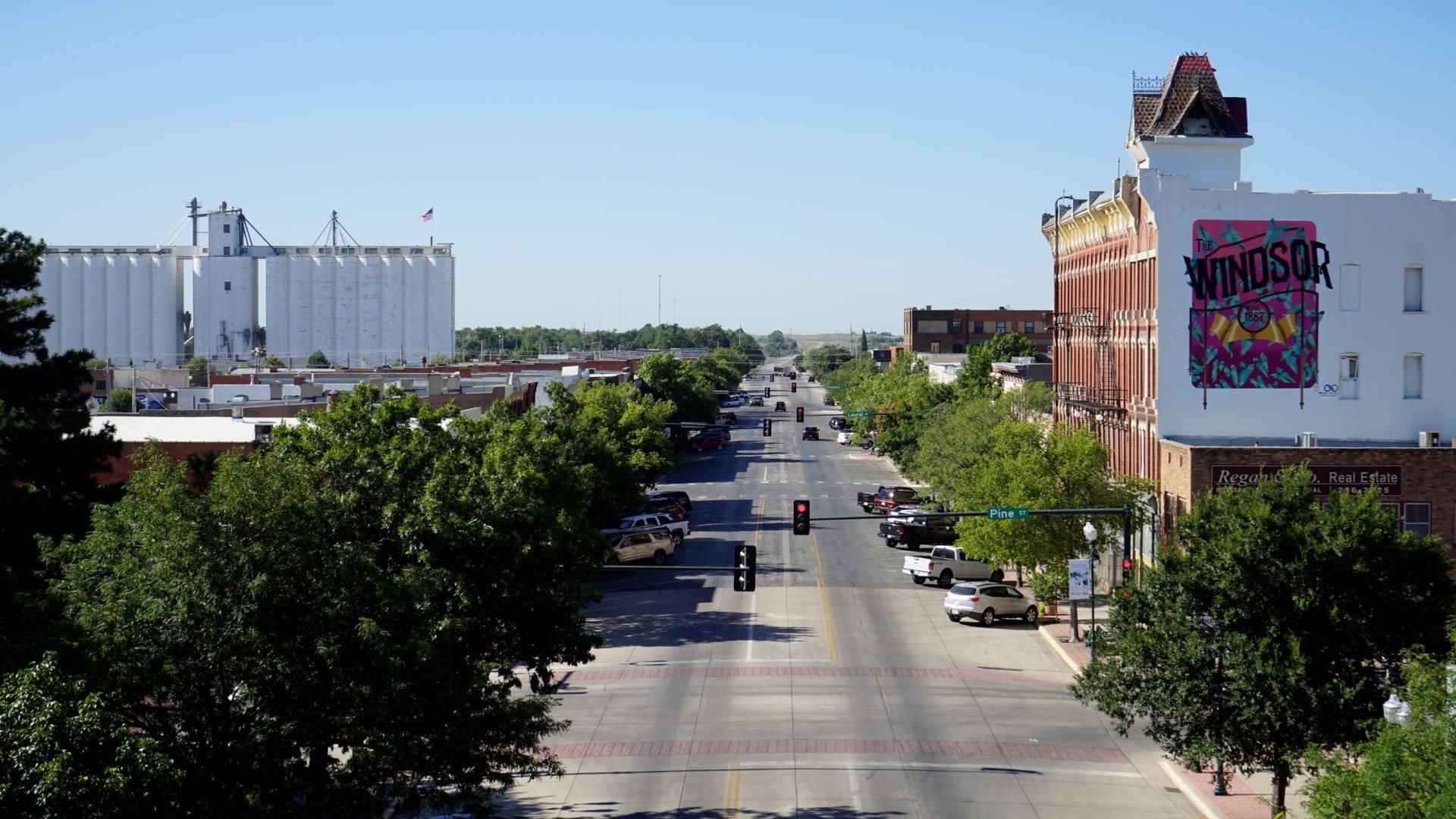 An aerial view of a city street with a building that says winchester on it