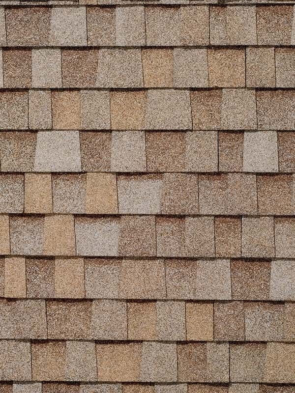 A close up of a roof with shingles on it.