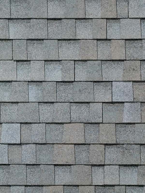 A close up of a roof with shingles on it.