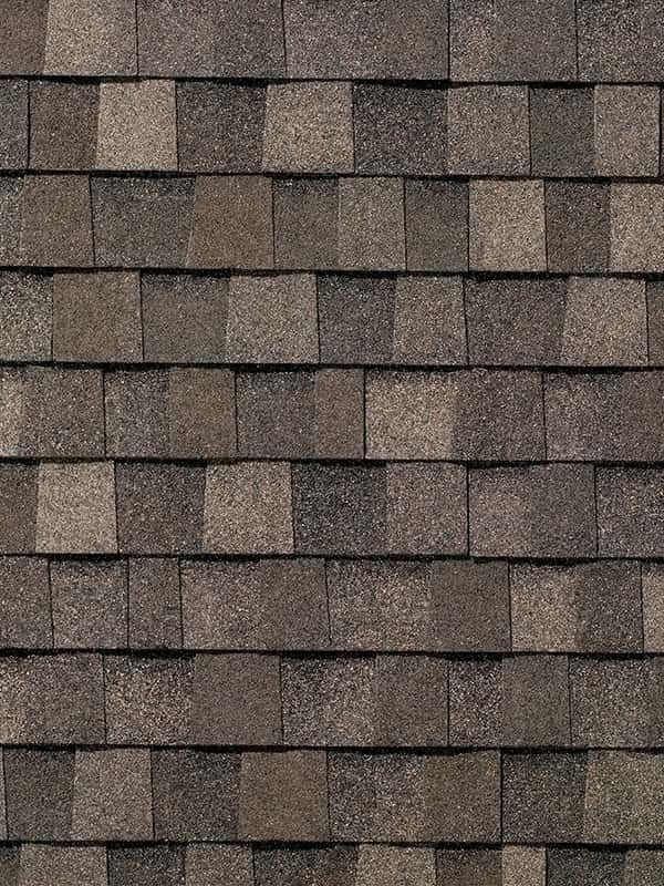 A close up of a roof with shingles on it.